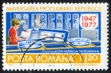 ROMANIA - CIRCA 1977: stamp printed by Romania, shows Computer production in Romania, circa 1977の写真素材