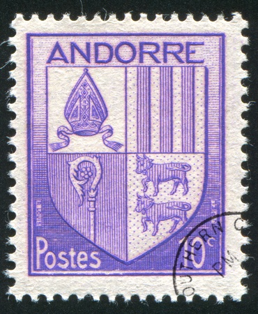 ANDORRA - CIRCA 1938: stamp printed by Andorra, shows arms, circa 1938.の写真素材