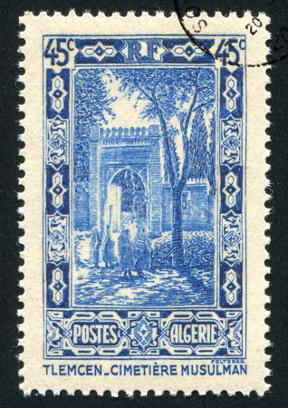 ALGERIA CIRCA 1941: stamp printed by Algeria, shows Sidi Bon Medine Cemetery at Tlemcen, circa 1941の写真素材