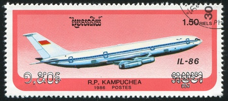CAMBODIA - CIRCA 1986: stamp printed by Cambodia, shows plane, circa 1986.の写真素材
