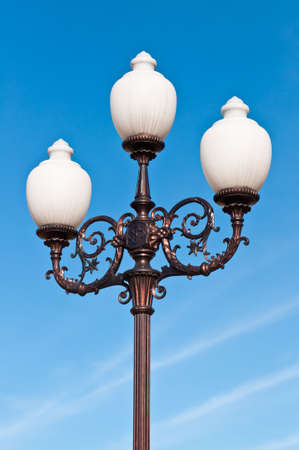 Antique lamp on the area of Kaliningrad, on the background of blue sky.の写真素材