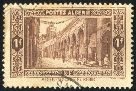 ALGERIA CIRCA 1936: stamp printed by Algeria, shows El-Kebir Mosque, Algiers, circa 1936の写真素材