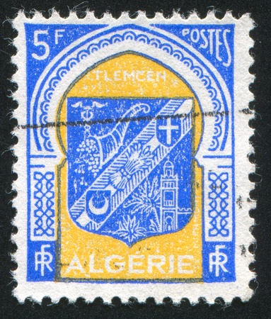 ALGERIA - CIRCA 1946: stamp printed by Algeria, shows arms, circa 1946.の写真素材