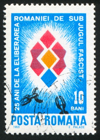 ROMANIA - CIRCA 1969: stamp printed by Romania, shows Broken Chain, circa 1969の写真素材