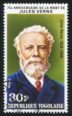 TOGO - CIRCA 1980: stamp printed by Togo, shows Jules Verne, French Science, Fiction Writer, circa 1980.のeditorial素材