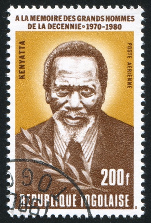 TOGO - CIRCA 1980: stamp printed by Togo, shows Jomo Kenyatta, circa 1980.のeditorial素材