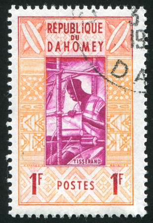 DAHOMEY CIRCA 1961: stamp printed by Dahomey, shows Weaver, circa 1961の写真素材