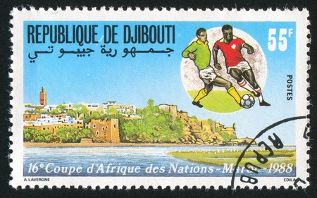 DJIBOUTI CIRCA 1988: stamp printed by Djibouti, shows 16th Africa Cup Soccer
Championships, Morocco, circa 1988の写真素材