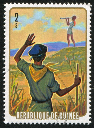 GUINEA CIRCA 1974: stamp printed by Guinea, shows Field observation, circa 1974の写真素材