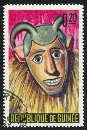 GUINEA CIRCA 1965: stamp printed by Guinea, shows Doudou Mask, Boke, circa 1965の写真素材