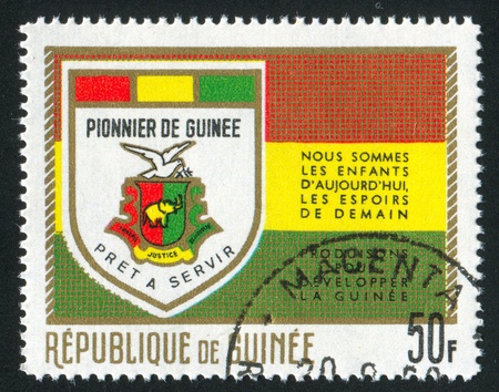 GUINEA CIRCA 1966: stamp printed by Guinea, shows Coat of Arms, circa 1966の写真素材