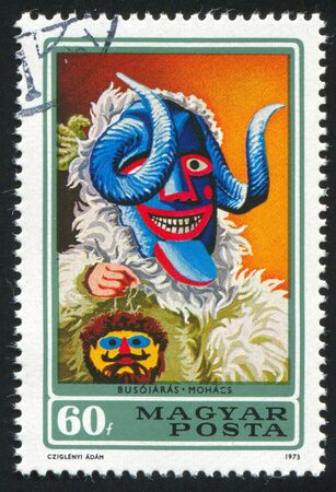 HUNGARY - CIRCA 1973: stamp printed by Hungary, shows Busho mask, circa 1973の写真素材