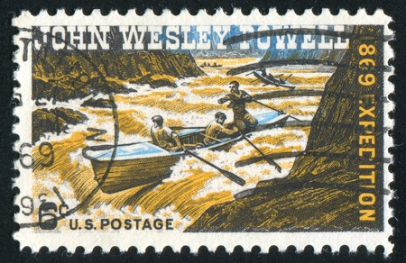 UNITED STATES - CIRCA 1969: stamp printed by United States of America, shows Powell, exploring Colorado river, circa 1969の写真素材