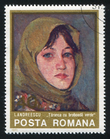 ROMANIA - CIRCA 1975: stamp printed by Romania, shows picture "Farm woman with Green Kerchief" by Ion Andreescu, circa 1975のeditorial素材