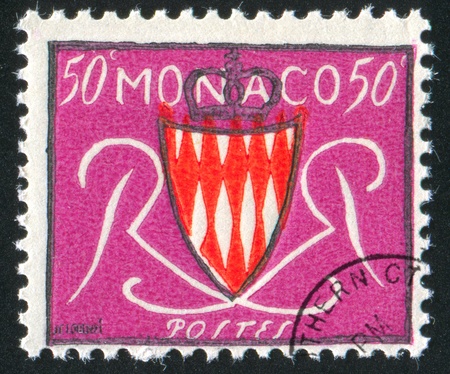 MONACO - CIRCA 1954: stamp printed by Monaco, shows Grimaldi Arms, circa 1954の写真素材