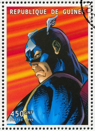 GUINEA - CIRCA 1999: stamp printed by Guinea, shows Captain America, circa 1999のeditorial素材
