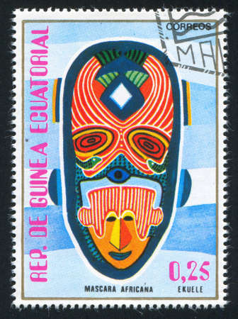 EQUATORIAL GUINEA - CIRCA 1977:  stamp printed by Equatorial Guinea, shows traditional mask, circa 1977.のeditorial素材