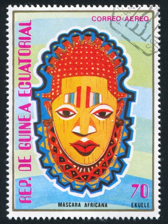 EQUATORIAL GUINEA - CIRCA 1977:  stamp printed by Equatorial Guinea, shows traditional mask, circa 1977.のeditorial素材