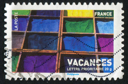 FRANCE - CIRCA 2007: stamp printed by France, shows boxes of colour pigments, circa 2007の写真素材