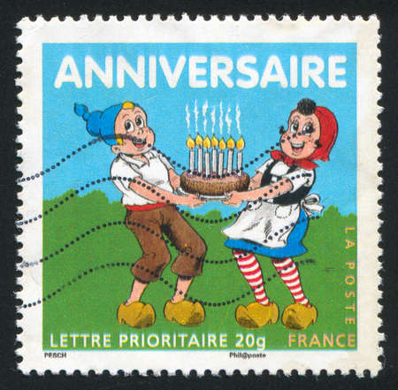 FRANCE - CIRCA 2007: stamp printed by France, shows boy and girl, circa 2007のeditorial素材