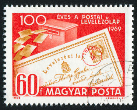 HUNGARY â CIRCA 1969: stamp printed by Hungary, shows postcard and mail box, circa 1969の写真素材