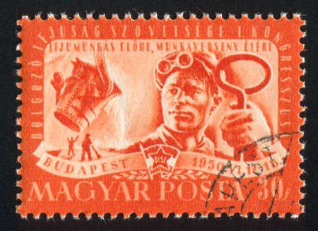 HUNGARY  CIRCA 1950: stamp printed by Hungary, shows workman with tool, circa 1950