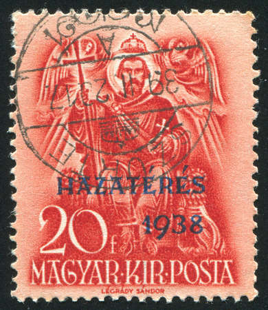 HUNGARY - CIRCA 1937: stamp printed by Hungary, shows Saint Stephen enthroned, circa 1937の写真素材