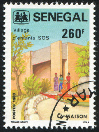SENEGAL - CIRCA 1984: stamp printed by Senegal, shows House, circa 1984のeditorial素材