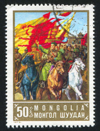 MONGOLIA - CIRCA 1973: stamp printed by Mongolia, shows Sukhe Bator leading partisans, circa 1973の写真素材