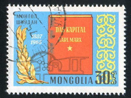MONGOLIA - CIRCA 1968: stamp printed by Mongolia, shows The Book "Das Kapital" by Karl Marx, circa 1968のeditorial素材