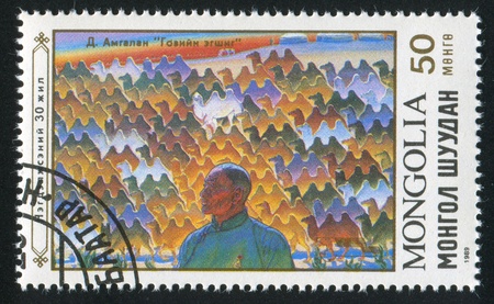 MONGOLIA - CIRCA 1989: stamp printed by Mongolia, shows picture "Man and camels" by Dagdan Amgalan, circa 1989のeditorial素材