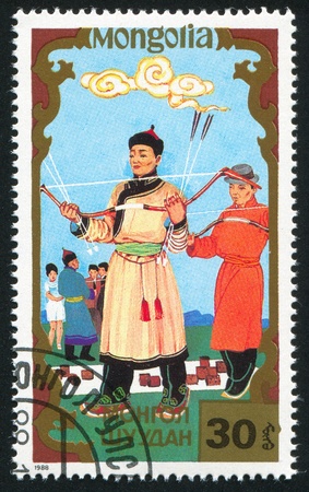 MONGOLIA - CIRCA 1988: stamp printed by Mongolia, shows Archery, circa 1988の写真素材