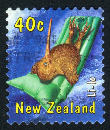 NEW ZEALAND - CIRCA 2000: stamp printed by New Zealand, shows Inflatable beach cushion, circa 2000の写真素材