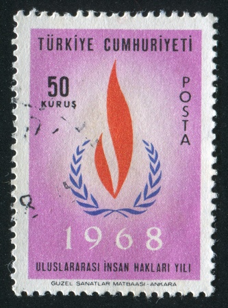 TURKEY- CIRCA 1967: stamp printed by Turkey, shows human rights flame, circa 1967のeditorial素材