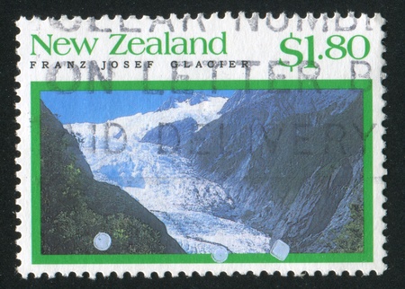 NEW ZEALAND - CIRCA 1992: stamp printed by New Zealand, shows Franz Josef glacier, circa 1992のeditorial素材