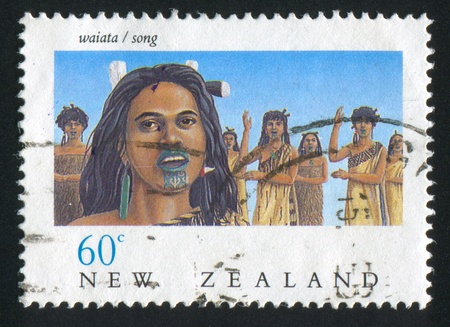 NEW ZEALAND - CIRCA 1990: stamp printed by New Zealand, shows Maori song, circa 1990のeditorial素材