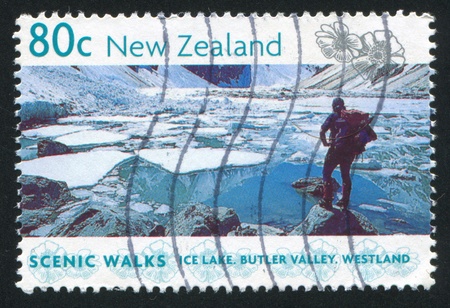 NEW ZEALAND - CIRCA 1999: stamp printed by New Zealand, shows ice lake, Butler valley, circa 1999のeditorial素材