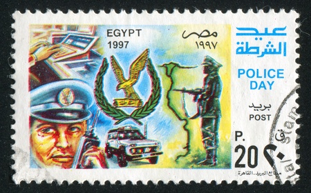 EGYPT - CIRCA 1997: stamp printed by Egypt, shows Police day, circa 1997のeditorial素材