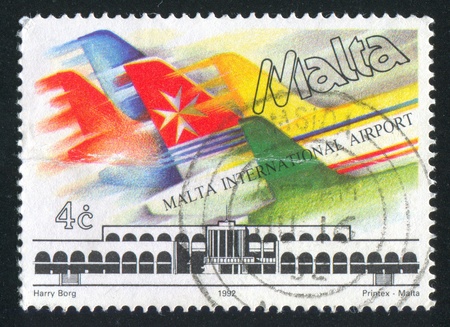 MALTA - CIRCA 1992: stamp printed by Malta, shows Malta International Airport, circa 1992のeditorial素材