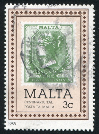 MALTA - CIRCA 1985: stamp printed by Malta, shows Malta woman, circa 1985のeditorial素材