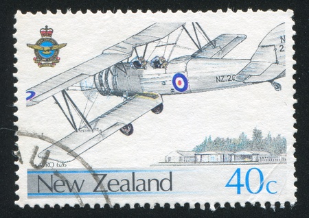NEW ZEALAND - CIRCA 1987: stamp printed by New Zealand, shows plane Avro 626 Wigram Air Base, circa 1987のeditorial素材