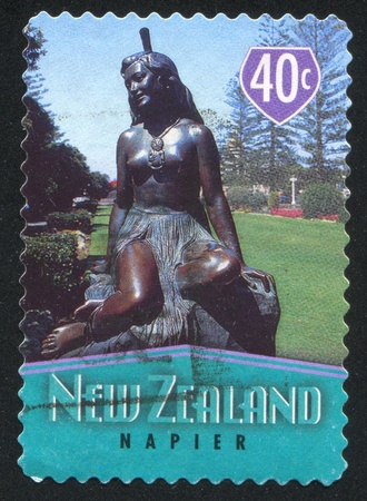 NEW ZEALAND - CIRCA 1998: stamp printed by New Zealand, shows Famous Town Icons, Pania of the Reef, Napier, circa 1998のeditorial素材