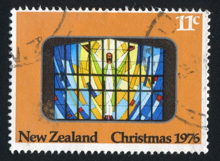 NEW ZEALAND - CIRCA 1976: stamp printed by New Zealand, shows Christmas, Risen Christ, St. Josephâs Church, Grey Lynn, Auckland, circa 1976のeditorial素材