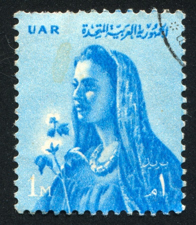 EGYPT - CIRCA 1957: stamp printed by Egypt, shows Farmerâs Wife, circa 1957.のeditorial素材