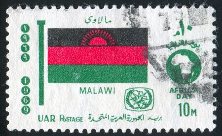 EGYPT - CIRCA 1969: stamp printed by Egypt, shows flag Malawi, circa 1969.のeditorial素材