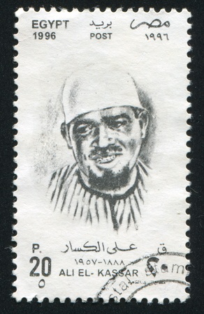 EGYPT - CIRCA 1996: stamp printed by Egypt, shows Ali Kassar, circa 1996.のeditorial素材