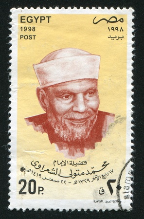 EGYPT - CIRCA 1998: stamp printed by Egypt, shows Imam Sheikh Mohamed Metwalli, circa 1998.のeditorial素材