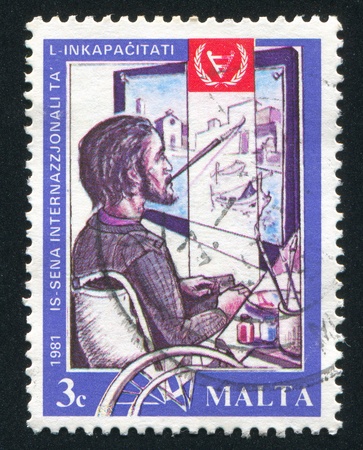 MALTA - CIRCA 1981: stamp printed by Malta, shows Disabled Artist, circa 1981のeditorial素材