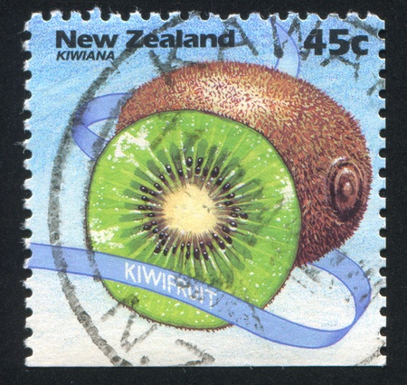NEW ZEALAND - CIRCA 1994: stamp printed by New Zealand, shows Kiwiana, Kiwi Fruit, circa 1994のeditorial素材