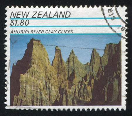 NEW ZEALAND - CIRCA 1991: stamp printed by New Zealand, shows Rock Formations, Ahuriri River Clay Cliffs, circa 1991のeditorial素材